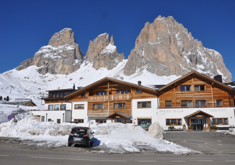 Passo Sella Dolomiti Mountain Resort Hotel has a prime ski-in ski-out location high in the Dolomites above Val Gardena