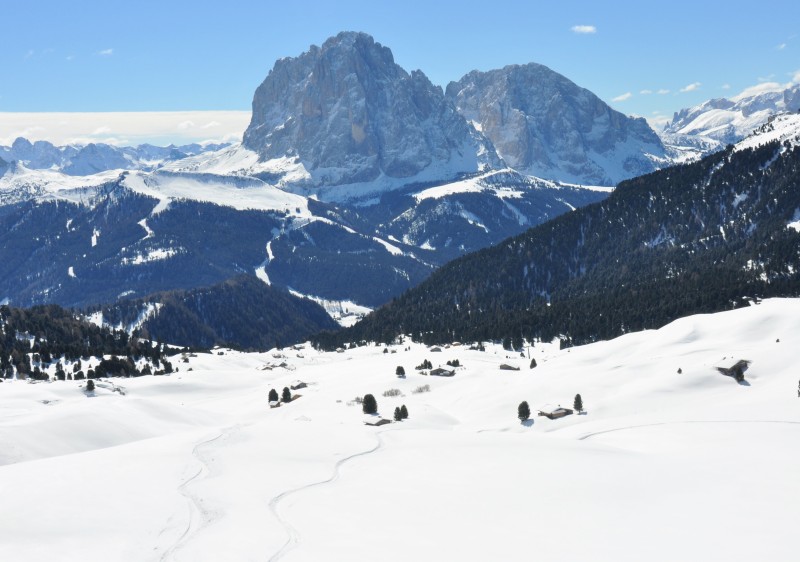 Sassolungo dominates the landscape across Val Gardena, including here heading down from Seceda